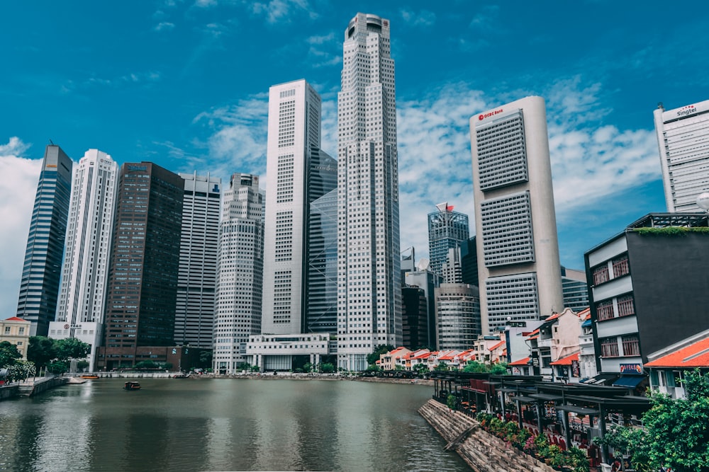 A mix of high-rise and low-rise buildings along the water in Singapore